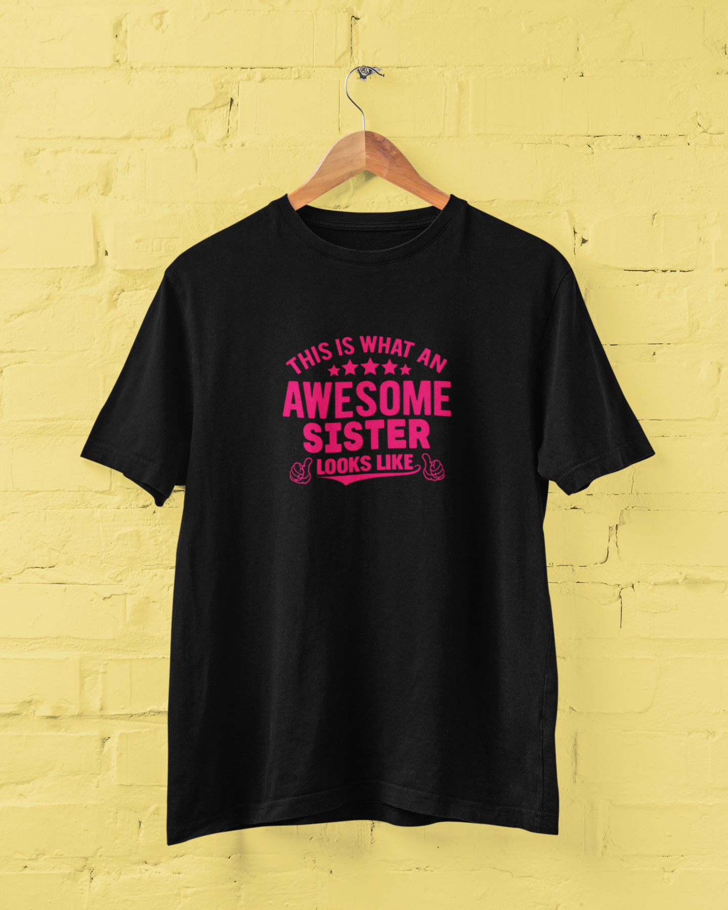 Awesome Sister Black T-Shirt for Women featuring "This Is What an Awesome Sister Looks Like" quote in bold pink typography with thumbs-up graphics. Funny sister graphic tee and perfect birthday gift for sisters. Available in sizes S-7XL - sigmatrends