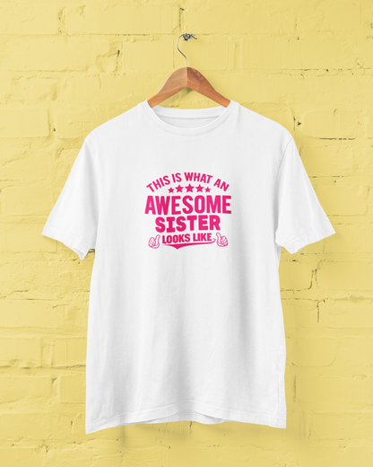 Awesome Sister white T-Shirt for Women featuring "This Is What an Awesome Sister Looks Like" quote in bold pink typography with thumbs-up graphics. Funny sister graphic tee and perfect birthday gift for sisters. Available in sizes S-7XL - sigmatrends
